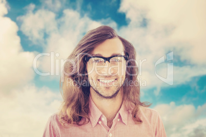 Composite image of happy hipster wearing eye glasses