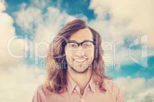 Composite image of happy hipster wearing eye glasses