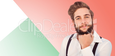 Composite image of confident hipster with hand on chin
