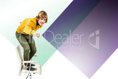 Composite image of happy hipster businessman standing on his cha
