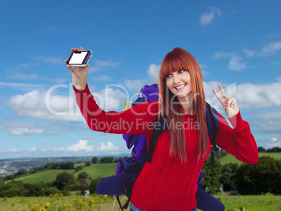 Composite image of smiling hipster woman with a travel bag takin