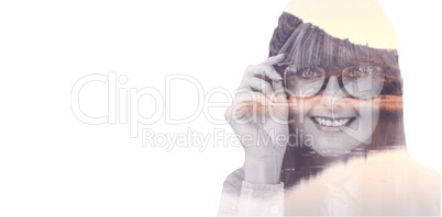 Composite image of smiling hipster woman looking at camera