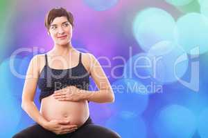 Composite image of thoughtful pregnant woman holding belly