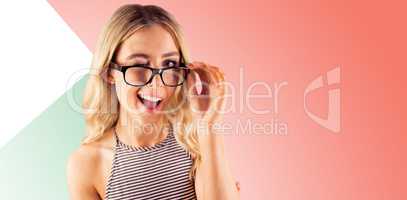 Composite image of gorgeous blonde hipster winking