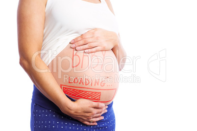 Composite image of pregnant woman holding her bump