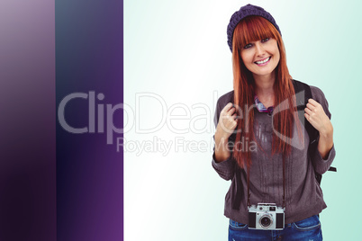 Composite image of portrait of a smiling hipster woman with a re