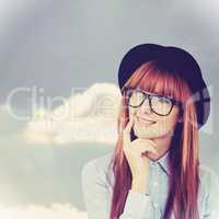 Composite image of smiling hipster woman posing face to the came