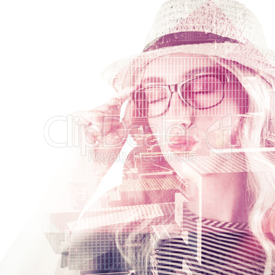 Composite image of gorgeous blonde hipster sending air kiss