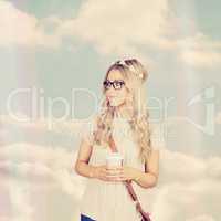Composite image of gorgeous blonde hipster leaning against red b