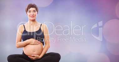 Composite image of portrait of happy expecting woman sitting on