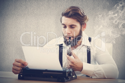 Composite image of hipster with smoking pipe working on typewrit