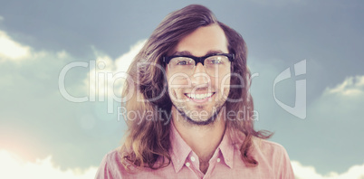 Composite image of happy hipster wearing eye glasses