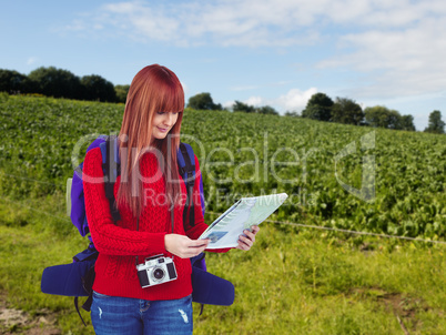 Composite image of smiling hipster woman with a travel bag with