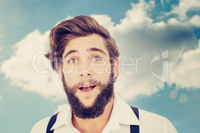 Composite image of portrait of surprised hipster