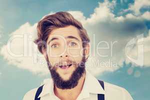 Composite image of portrait of surprised hipster