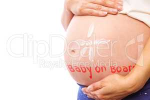 Composite image of pregnant woman with cream on bump