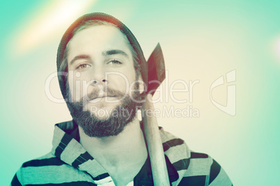 Composite image of close-up portrait of hipster with hooded shir