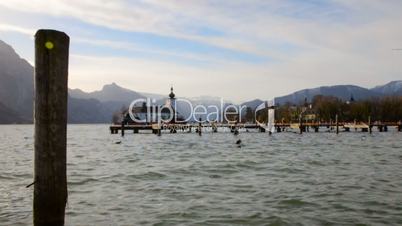 Lake Traunsee and Schloss Castle Ort in Upper Austria on a warm spring morning