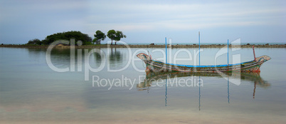 Traditional boat is in the bay. Thailand