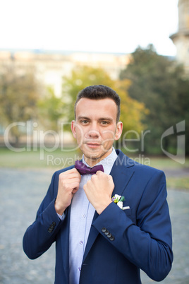 Confident bride in an expensive suit