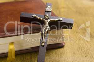 Catholic cross on the book