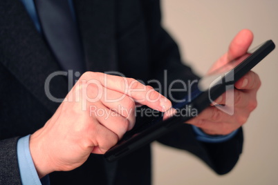 Businessman using tablet computer