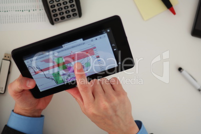 Businessman using tablet computer