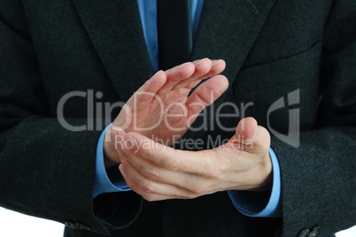 Businessmans hands applauding