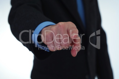 Businessman pointing finger at you