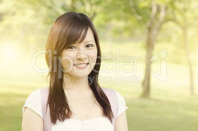 Young college girl student smiling
