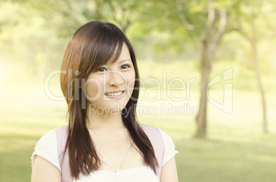 Asian college girl student smiling