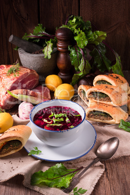 beet green soup with pastries