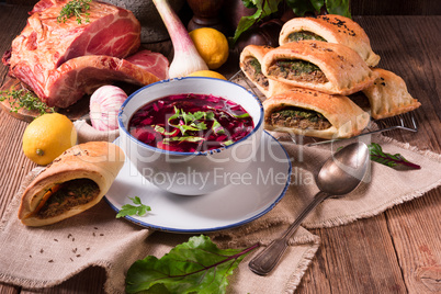 beet green soup with pastries