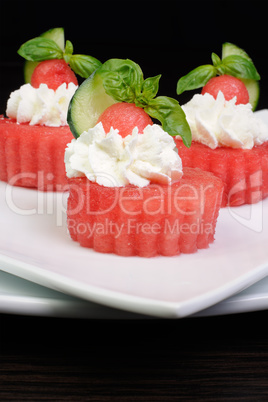 Appetizer of watermelon with ricotta