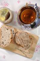 Chicken liver pate on bread and in jar