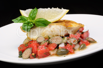 slice of baked fish perch with vegetables