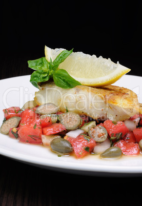 slice of baked fish perch with vegetables
