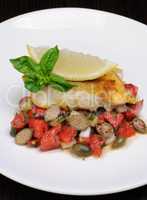 slice of baked fish perch with vegetables