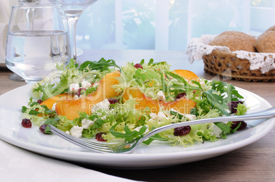 Light salad with peaches