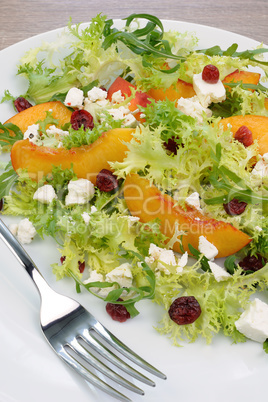 Light salad with peaches