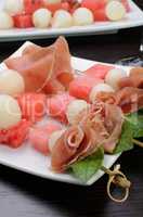 ham with melon and watermelon