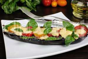 Baked eggplant with tomatoes and cheese