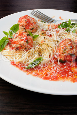 Pasta in tomato gravy with meatballs