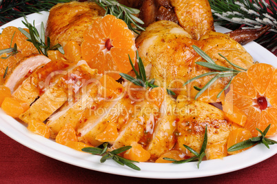 Baked chicken in tangerine sauce