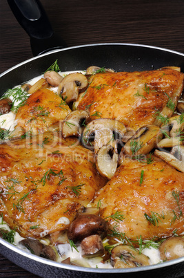 part of the chicken in a creamy sauce with mushrooms
