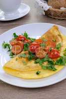 Omelette with tomatoes and herbs