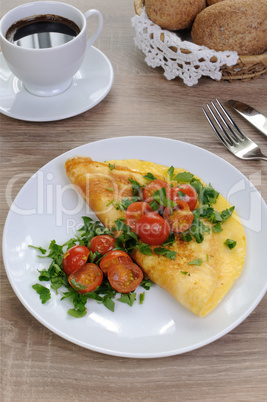 Omelette with tomatoes and herbs