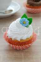 Cupcakes with butter cream and marzipan decoration