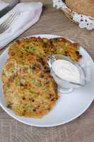 Fritters of zucchini and peas