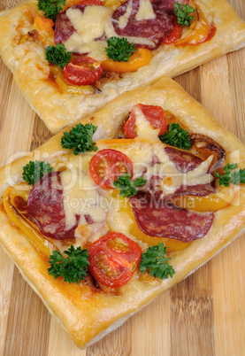 Mini pizza with salami